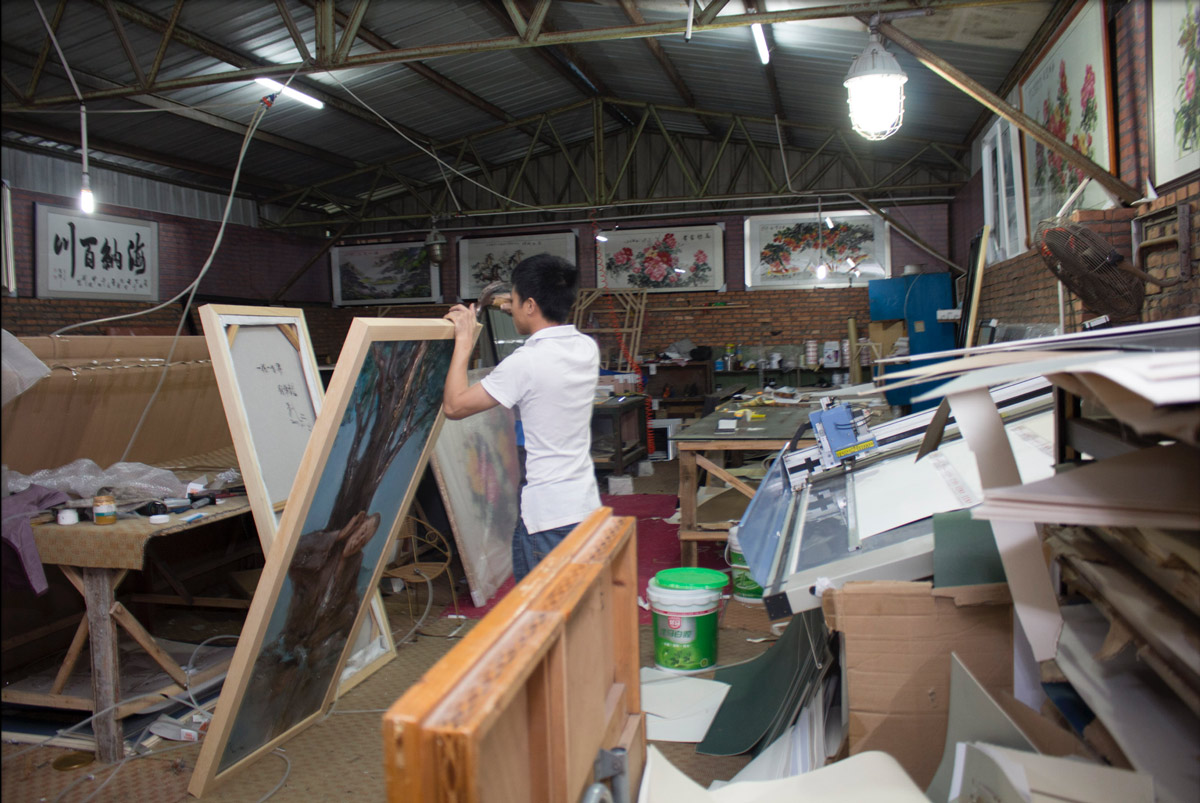 This art studio also has their own framing shop where they hand make the frames from wooden bars.